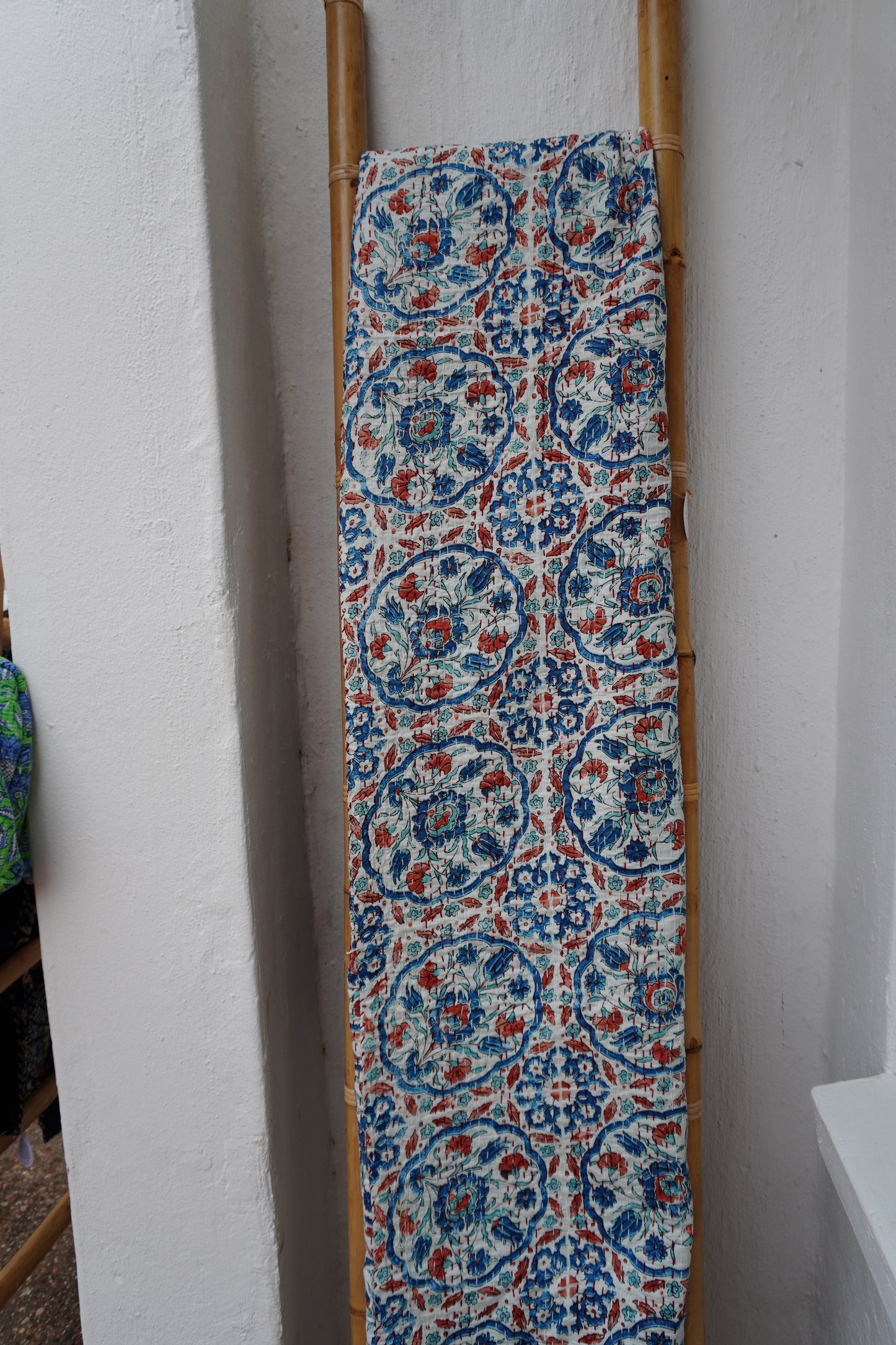 Kantha Quilt in white with RUST AND NAVY FLORALS